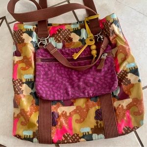 Like new vinyl coated canvas Fossil brand Key-per tote bag.
